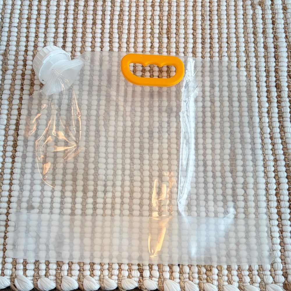 Outdoor enthusiasts Clear Plastic Water Bag with Yellow Handle
